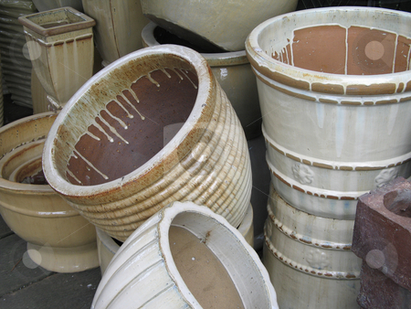 To use this stock image in your creative project, please select the size you need over to the right and click the "Add to Cart" button.
Your downloaded image will come with the Cutcaster watermark removed so don’t worry about the watermark you see on this page. Ceramic hand made plant pots stock photo, Ceramic hand made plant pots by Mbudley Mbudley