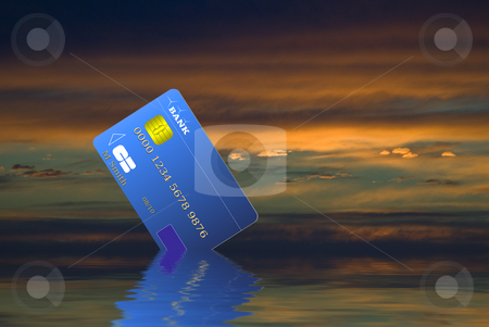 To use this stock image in your creative project, please select the size you need over to the right and click the "Add to Cart" button.
Your downloaded image will come with the Cutcaster watermark removed so don’t worry about the watermark you see on this page. Economy stock photo, Credit card sinking with the economy during recession - Computer illustration by Serge VILLA