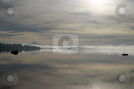 To use this stock image in your creative project, please select the size you need over to the right and click the "Add to Cart" button.
Your downloaded image will come with the Cutcaster watermark removed so don’t worry about the watermark you see on this page. Morning fog stock photo, December 22, 2003: As the early morning fog in SIlverdale, Washington burned off Mt. Rainier could be seen overlooking Dyes Inlet. by Jesse Beals