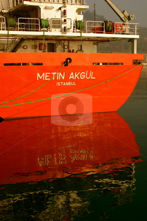 To use this stock image in your creative project, please select the size you need over to the right and click the "Add to Cart" button.
Your downloaded image will come with the Cutcaster watermark removed so don’t worry about the watermark you see on this page. Turkish-Registered container ship stock photo, A container ship by Jeff Crowe