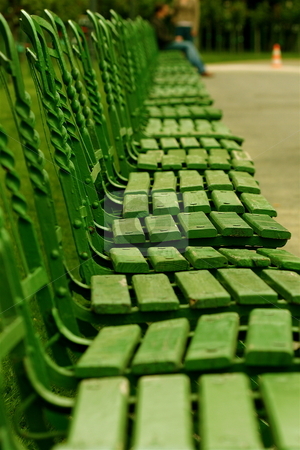 To use this stock image in your creative project, please select the size you need over to the right and click the "Add to Cart" button.
Your downloaded image will come with the Cutcaster watermark removed so don’t worry about the watermark you see on this page. Row of Park Chairs stock photo, A row of wooden green chairs in a park in Vienna by Jeff Crowe