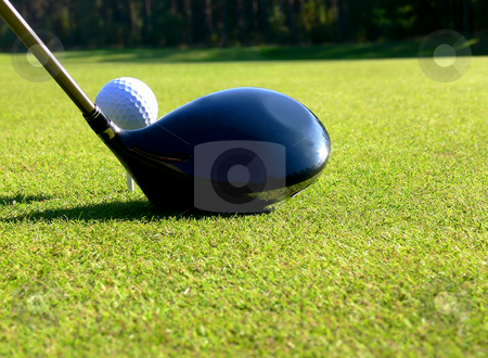 To use this stock image in your creative project, please select the size you need over to the right and click the "Add to Cart" button.
Your downloaded image will come with the Cutcaster watermark removed so don’t worry about the watermark you see on this page. Golf - Tee Off stock photo, Close-up of a driver and a ball on 1st tee by Niklas Ramberg