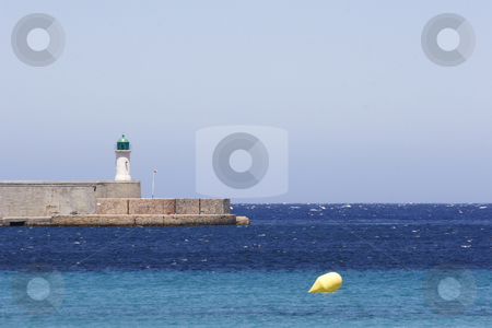 To use this stock image in your creative project, please select the size you need over to the right and click the "Add to Cart" button.
Your downloaded image will come with the Cutcaster watermark removed so don’t worry about the watermark you see on this page. Light house on harbor entrance corsica stock photo, Lighthouse on port entrance to corsica island by Mark Yuill
