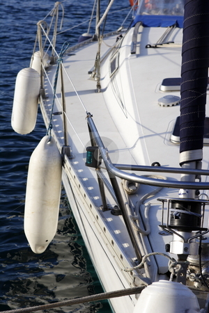 To use this stock image in your creative project, please select the size you need over to the right and click the "Add to Cart" button.
Your downloaded image will come with the Cutcaster watermark removed so don’t worry about the watermark you see on this page. Close up detail of sailing yacht stock photo, Close up detail of sailing yacht in port by Mark Yuill