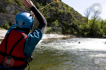 To use this stock image in your creative project, please select the size you need over to the right and click the "Add to Cart" button.
Your downloaded image will come with the Cutcaster watermark removed so don’t worry about the watermark you see on this page. Kayak paddlers practising river rescues stock photo, Kayak paddlers practising river rescues on moving water by Mark Yuill