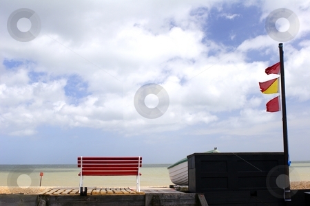 To use this stock image in your creative project, please select the size you need over to the right and click the "Add to Cart" button.
Your downloaded image will come with the Cutcaster watermark removed so don’t worry about the watermark you see on this page. Bench and flags stock photo, Bench with a view by Mark Yuill
