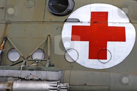 To use this stock image in your creative project, please select the size you need over to the right and click the "Add to Cart" button.
Your downloaded image will come with the Cutcaster watermark removed so don’t worry about the watermark you see on this page. Red cross stock photo, Red cross on helicopter fuselage by Mark Yuill