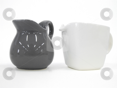 To use this stock image in your creative project, please select the size you need over to the right and click the "Add to Cart" button.
Your downloaded image will come with the Cutcaster watermark removed so don’t worry about the watermark you see on this page. Teapot and Milk Pot isolated stock photo, Teapot and Milk Pot isolated with path by Paulo Resende