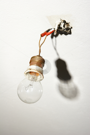 To use this stock image in your creative project, please select the size you need over to the right and click the "Add to Cart" button.
Your downloaded image will come with the Cutcaster watermark removed so don’t worry about the watermark you see on this page. Light bulb hanging from bare wires stock photo, Light bulb hanging from bare wires with shadow by Mark Yuill