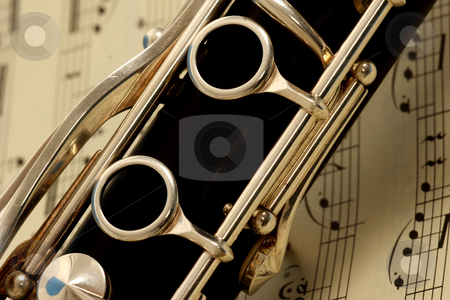 To use this stock image in your creative project, please select the size you need over to the right and click the "Add to Cart" button.
Your downloaded image will come with the Cutcaster watermark removed so don’t worry about the watermark you see on this page. Clarinet stock photo, Close up detail of a woodwind clarinet by Mark Yuill