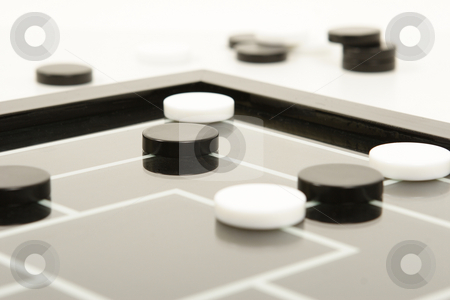 To use this stock image in your creative project, please select the size you need over to the right and click the "Add to Cart" button.
Your downloaded image will come with the Cutcaster watermark removed so don’t worry about the watermark you see on this page. Black and white board game stock photo, draughs or checkers black and white board game by Mark Yuill