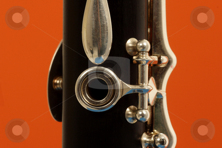To use this stock image in your creative project, please select the size you need over to the right and click the "Add to Cart" button.
Your downloaded image will come with the Cutcaster watermark removed so don’t worry about the watermark you see on this page. Clarinet stock photo, Close up detail of a woodwind clarinet by Mark Yuill