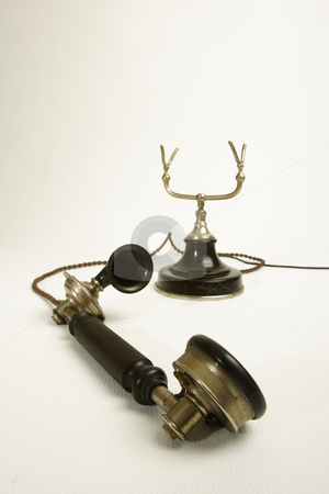 To use this stock image in your creative project, please select the size you need over to the right and click the "Add to Cart" button.
Your downloaded image will come with the Cutcaster watermark removed so don’t worry about the watermark you see on this page. Old telephone stock photo, Old telephone by Mark Yuill