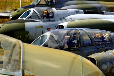 To use this stock image in your creative project, please select the size you need over to the right and click the "Add to Cart" button.
Your downloaded image will come with the Cutcaster watermark removed so don’t worry about the watermark you see on this page. Abandoned jet fighters stock photo, Abandoned jet fighter planes by Mark Yuill