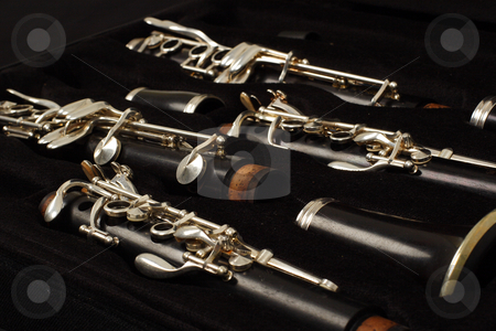 To use this stock image in your creative project, please select the size you need over to the right and click the "Add to Cart" button.
Your downloaded image will come with the Cutcaster watermark removed so don’t worry about the watermark you see on this page. Clarinet stock photo, Close up detail of a woodwind clarinet by Mark Yuill