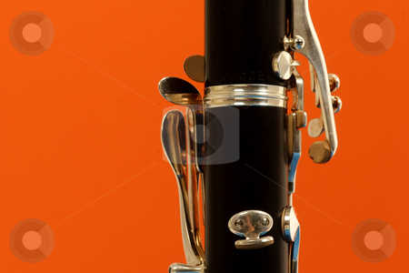 To use this stock image in your creative project, please select the size you need over to the right and click the "Add to Cart" button.
Your downloaded image will come with the Cutcaster watermark removed so don’t worry about the watermark you see on this page. Clarinet stock photo, Close up detail of a woodwind clarinet by Mark Yuill