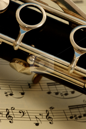 To use this stock image in your creative project, please select the size you need over to the right and click the "Add to Cart" button.
Your downloaded image will come with the Cutcaster watermark removed so don’t worry about the watermark you see on this page. Clarinet stock photo, Close up detail of a woodwind clarinet by Mark Yuill
