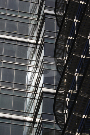 To use this stock image in your creative project, please select the size you need over to the right and click the "Add to Cart" button.
Your downloaded image will come with the Cutcaster watermark removed so don’t worry about the watermark you see on this page. Modern office building stock photo, Reflection, shapes and textures of modern office building by Mark Yuill