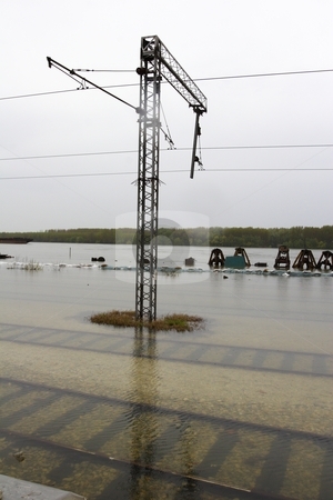 To use this stock image in your creative project, please select the size you need over to the right and click the "Add to Cart" button.
Your downloaded image will come with the Cutcaster watermark removed so don’t worry about the watermark you see on this page. Flooded railway stock photo, Flooded rail yard Smedrevo Serbia by Mark Yuill