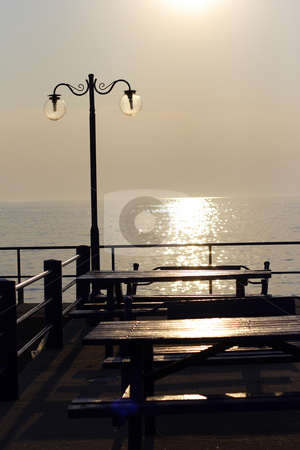 To use this stock image in your creative project, please select the size you need over to the right and click the "Add to Cart" button.
Your downloaded image will come with the Cutcaster watermark removed so don’t worry about the watermark you see on this page. Sunset over fishing village in greece stock photo, Sunset over fishing village in greek islands by Mark Yuill
