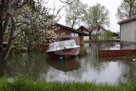 To use this stock image in your creative project, please select the size you need over to the right and click the "Add to Cart" button.
Your downloaded image will come with the Cutcaster watermark removed so don’t worry about the watermark you see on this page. Flooded homes stock photo, Flood damaged property by Mark Yuill