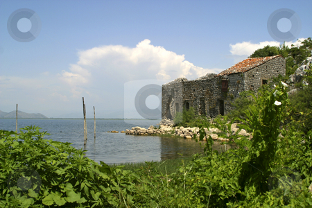 To use this stock image in your creative project, please select the size you need over to the right and click the "Add to Cart" button.
Your downloaded image will come with the Cutcaster watermark removed so don’t worry about the watermark you see on this page. Abandoned fishing village stock photo, by Mark Yuill