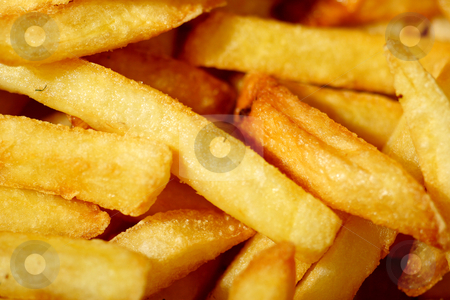 To use this stock image in your creative project, please select the size you need over to the right and click the "Add to Cart" button.
Your downloaded image will come with the Cutcaster watermark removed so don’t worry about the watermark you see on this page. French fries stock photo, Close up photograph of french frie or chips, by Mark Yuill