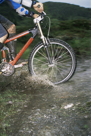 To use this stock image in your creative project, please select the size you need over to the right and click the "Add to Cart" button.
Your downloaded image will come with the Cutcaster watermark removed so don’t worry about the watermark you see on this page. Mountain biker crossing stream stock photo, Mountain biker crossing stream by Monkey Business Images