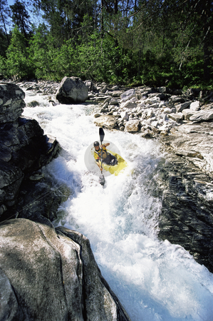To use this stock image in your creative project, please select the size you need over to the right and click the "Add to Cart" button.
Your downloaded image will come with the Cutcaster watermark removed so don’t worry about the watermark you see on this page. Young man kayaking in rapids stock photo, by Monkey Business Images