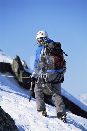 To use this stock image in your creative project, please select the size you need over to the right and click the "Add to Cart" button.
Your downloaded image will come with the Cutcaster watermark removed so don’t worry about the watermark you see on this page. Young man mountain climbing on snowy peak stock photo, Young man mountain climbing on snowy peak by Monkey Business Images
