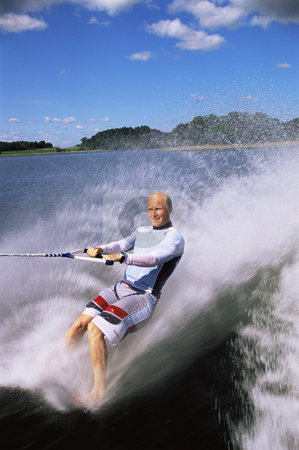 To use this stock image in your creative project, please select the size you need over to the right and click the "Add to Cart" button.
Your downloaded image will come with the Cutcaster watermark removed so don’t worry about the watermark you see on this page. Man water skiing stock photo, Man water skiing by Monkey Business Images
