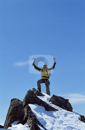 To use this stock image in your creative project, please select the size you need over to the right and click the "Add to Cart" button.
Your downloaded image will come with the Cutcaster watermark removed so don’t worry about the watermark you see on this page. Climber on mountain top stock photo, Young man celebrating reaching the top of a mountain by Monkey Business Images