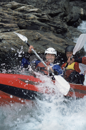 To use this stock image in your creative project, please select the size you need over to the right and click the "Add to Cart" button.
Your downloaded image will come with the Cutcaster watermark removed so don’t worry about the watermark you see on this page. White water rafting stock photo, Two people paddling inflatable boat down rapids by Monkey Business Images