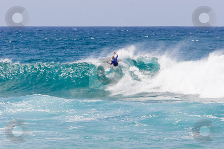 To use this stock image in your creative project, please select the size you need over to the right and click the "Add to Cart" button.
Your downloaded image will come with the Cutcaster watermark removed so don’t worry about the watermark you see on this page. Surfing stock photo, Surfer on the crest of a wave by Nicholas Rjabow