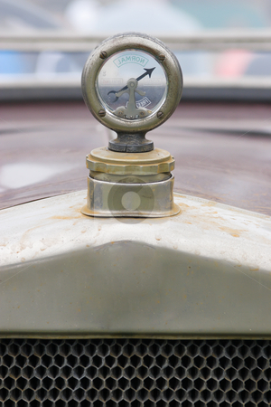 To use this stock image in your creative project, please select the size you need over to the right and click the "Add to Cart" button.
Your downloaded image will come with the Cutcaster watermark removed so don’t worry about the watermark you see on this page. Vintage Thermostat stock photo, A vintage vehicles external temperature gauge by Nicholas Rjabow