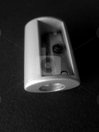 To use this stock image in your creative project, please select the size you need over to the right and click the "Add to Cart" button.
Your downloaded image will come with the Cutcaster watermark removed so don’t worry about the watermark you see on this page. Pencil sharpener stock photo, Close-up of a small, rounded metal pencil sharpener. Isolated on black by Martin Darley