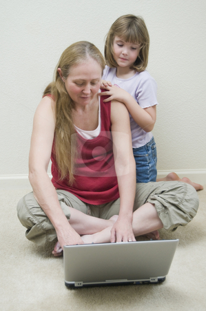 To use this stock image in your creative project, please select the size you need over to the right and click the "Add to Cart" button.
Your downloaded image will come with the Cutcaster watermark removed so don’t worry about the watermark you see on this page. Grandmother showing granddaughter the computer. stock photo, Enjoying the company of Grandma. by RCarner Photography