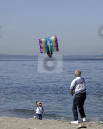 To use this stock image in your creative project, please select the size you need over to the right and click the "Add to Cart" button.
Your downloaded image will come with the Cutcaster watermark removed so don’t worry about the watermark you see on this page. Walking on the beach stock photo, August 17, 2004 : The sandy beach of Point no Point park in Hansville, Washington is a very popular place to hang out in the summer. by Jesse Beals