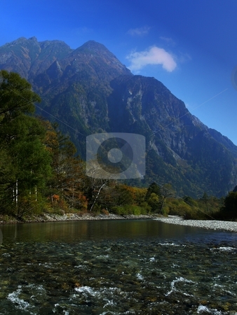To use this stock image in your creative project, please select the size you need over to the right and click the "Add to Cart" button.
Your downloaded image will come with the Cutcaster watermark removed so don’t worry about the watermark you see on this page. Alpine Mountin stock photo, Mount Myojin towers over the Azusa River, at the heart of the Japanese Alps. Kamikochi, Nagano Prefecture, Japan by Martin Darley