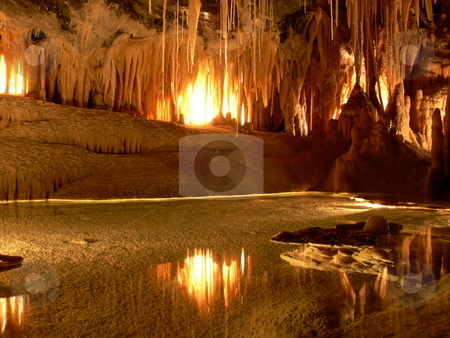 To use this stock image in your creative project, please select the size you need over to the right and click the "Add to Cart" button.
Your downloaded image will come with the Cutcaster watermark removed so don’t worry about the watermark you see on this page. Reflecting Cave stock photo, Light reflects off the water on the floor of a cave. Mole Creek, Tasmania, Australia by Martin Darley