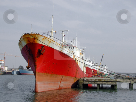 To use this stock image in your creative project, please select the size you need over to the right and click the "Add to Cart" button.
Your downloaded image will come with the Cutcaster watermark removed so don’t worry about the watermark you see on this page. Big ship into dock stock photo, Big ship into dock by Paulo Resende