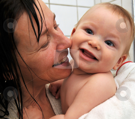 To use this stock image in your creative project, please select the size you need over to the right and click the "Add to Cart" button.
Your downloaded image will come with the Cutcaster watermark removed so don’t worry about the watermark you see on this page. Baby and mother after shower stock photo, by Johan Lenell
