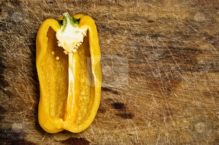 To use this stock image in your creative project, please select the size you need over to the right and click the "Add to Cart" button.
Your downloaded image will come with the Cutcaster watermark removed so don’t worry about the watermark you see on this page. Yellow bell pepper. stock photo, Yellow bell pepper cut on a wooden cutting table. by Pablo Caridad
