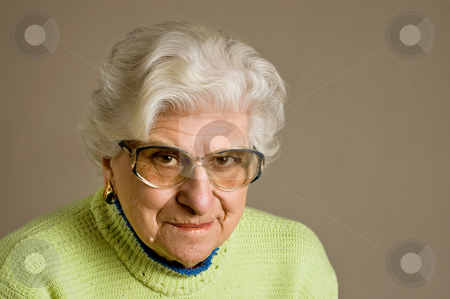 To use this stock image in your creative project, please select the size you need over to the right and click the "Add to Cart" button.
Your downloaded image will come with the Cutcaster watermark removed so don’t worry about the watermark you see on this page. Senior lady portrait, smiling. stock photo, Senior lady portrait, smiling, glasses, with copy space. by Pablo Caridad