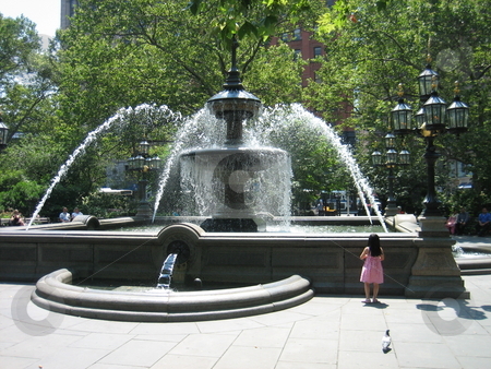 To use this stock image in your creative project, please select the size you need over to the right and click the "Add to Cart" button.
Your downloaded image will come with the Cutcaster watermark removed so don’t worry about the watermark you see on this page. Fountain stock photo, Fountain in New York City park by Tom Falco
