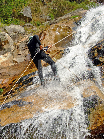 To use this stock image in your creative project, please select the size you need over to the right and click the "Add to Cart" button.
Your downloaded image will come with the Cutcaster watermark removed so don’t worry about the watermark you see on this page. Men descending on rappel stock photo, Men descending waterfall in Portugal by Paulo Resende