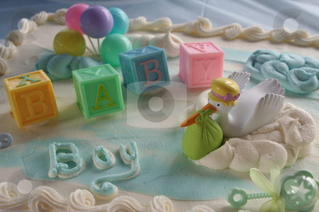 To use this stock image in your creative project, please select the size you need over to the right and click the "Add to Cart" button.
Your downloaded image will come with the Cutcaster watermark removed so don’t worry about the watermark you see on this page. Baby Shower Cake stock photo, Cake for a baby boy shower by Debbie Hayes