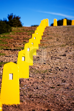 To use this stock image in your creative project, please select the size you need over to the right and click the "Add to Cart" button.
Your downloaded image will come with the Cutcaster watermark removed so don’t worry about the watermark you see on this page. Yellow restrictive posts in Madeira stock photo, Yellow restrictive posts in Madeira mountains by Vitaly Sokolovskiy