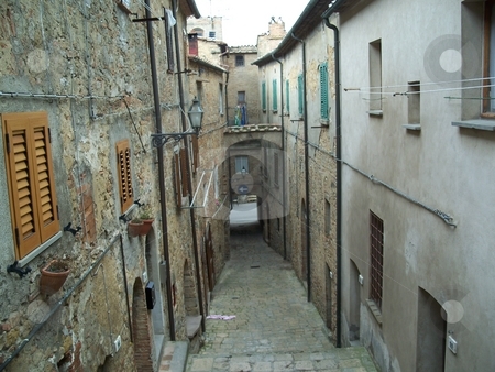 To use this stock image in your creative project, please select the size you need over to the right and click the "Add to Cart" button.
Your downloaded image will come with the Cutcaster watermark removed so don’t worry about the watermark you see on this page. A Historic Narrow Street In Volterra Italy stock photo, I picturesque photo of a narrow street in volterra italy. by Andy C