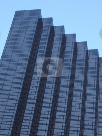 To use this stock image in your creative project, please select the size you need over to the right and click the "Add to Cart" button.
Your downloaded image will come with the Cutcaster watermark removed so don’t worry about the watermark you see on this page. Skyscraper in Manhattan, New York stock photo, by Ritu Jethani